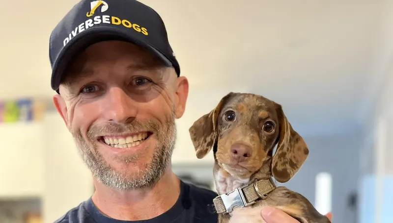 Tim from Diverse Dogs with puppy